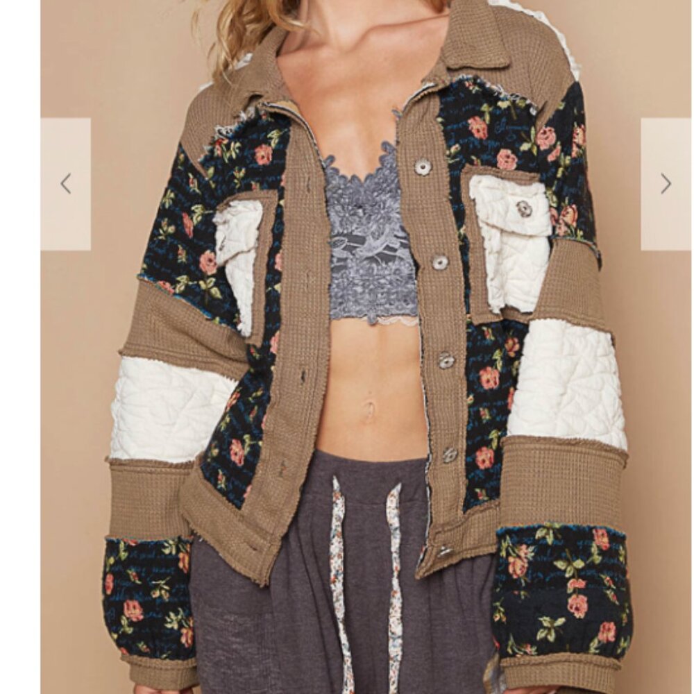 151.Jacket top in quilting with jacquard patch, front pockets, floral pattern.
